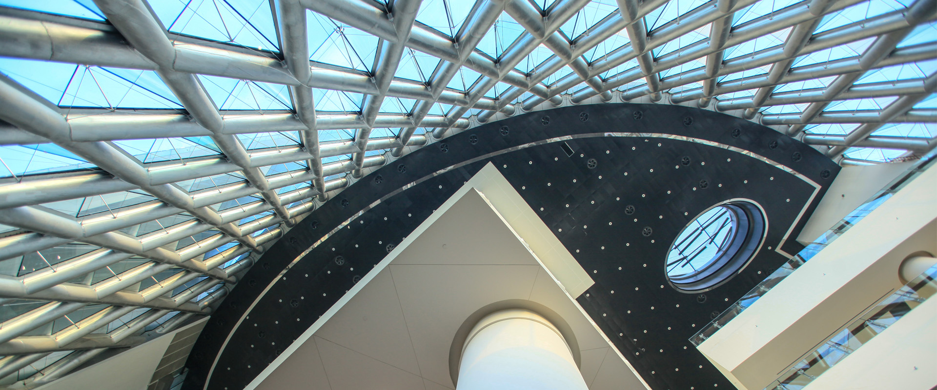 The circular façade with its diamond-shaped glass panels defines the home of Meydan Gallery and Museum.