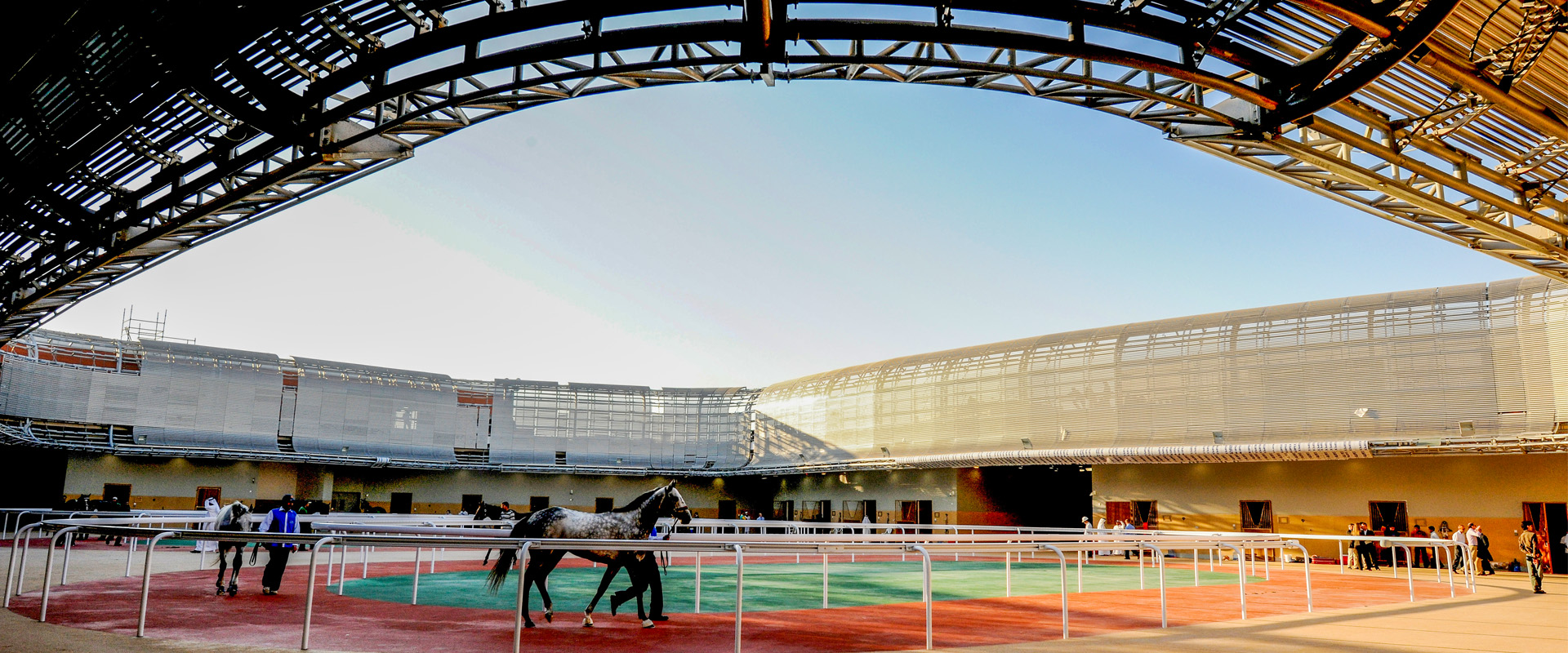 A new feature in grandstand design is the integrated receiving barn where horses are “received” and “cared-for” prior to their race.